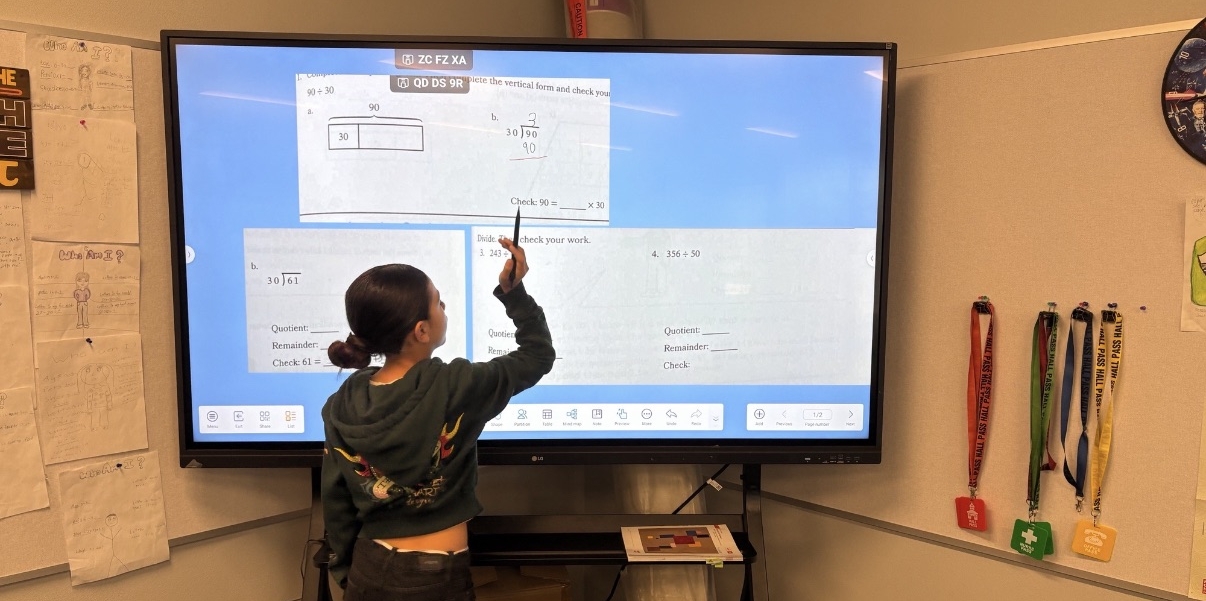 LG Powers interactive learning environment at Rose Salgado Elementary School — students engaged in classroom activities using digital boards and educational tools in a modern K-5 campus