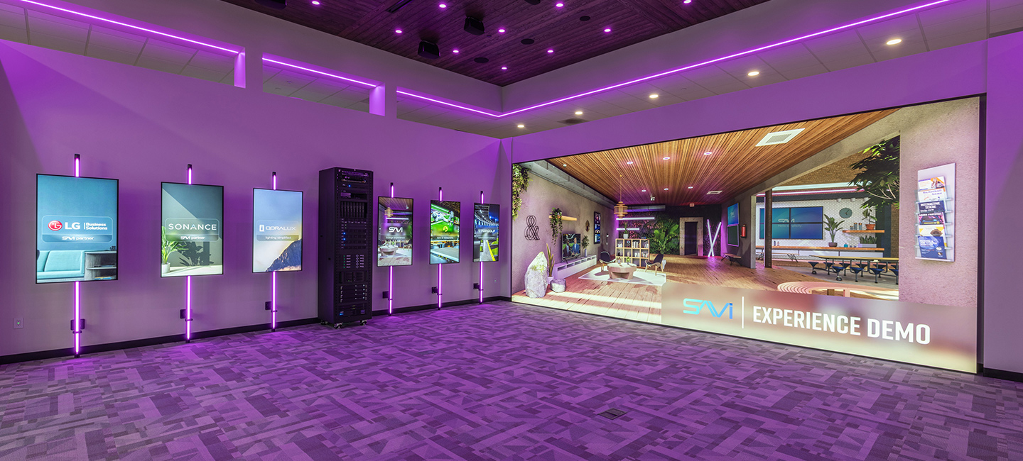 SAVI's Experience Center showcases a wall-sized LG MAGNIT display and vertical LG digital signage.