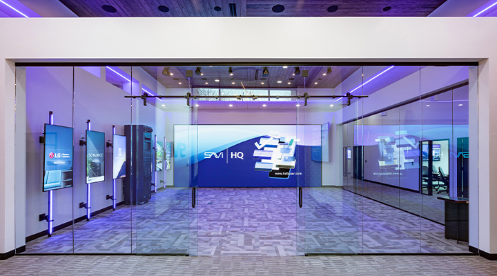 The entrance to SAVI HQ reveals the impressive LG digital display wall inside the Experience Center.