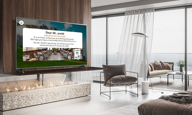An LG commercial TV is installed in a resort room.